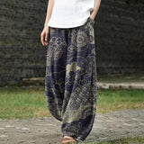 Lucienne – Pantalon large bleu marine à motif de chrysanthèmes