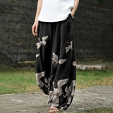 Françoise – Pantalon large noir à motif de grues