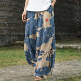 Geneviève – Pantalon large beige à motif bleu
