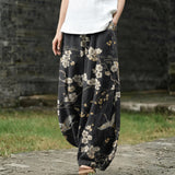 Ghislaine – Pantalon large noir à motif d'oiseaux