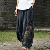 Capucine – Pantalon large bleu foncé à motif de soleil