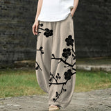 Céleste – Pantalon large beige à motifs floraux
